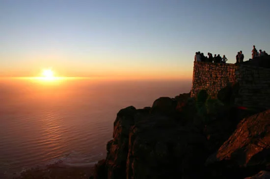 Sunset from Table Mountain - Cape Town | Photo by: Luca Galuzzi - Wikimedia Commons Sunset from Table Mountain - Cape Town